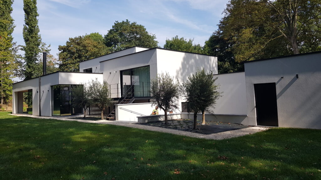 Transformation d’une habitation avec toiture a versants en toit plat – Tournai