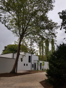 Transformation d’une habitation avec toiture a versants en toit plat – Tournai